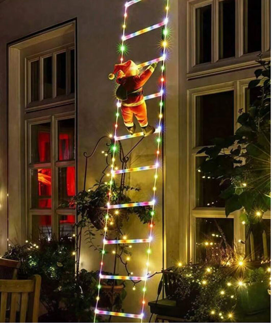 Santa climbing lader